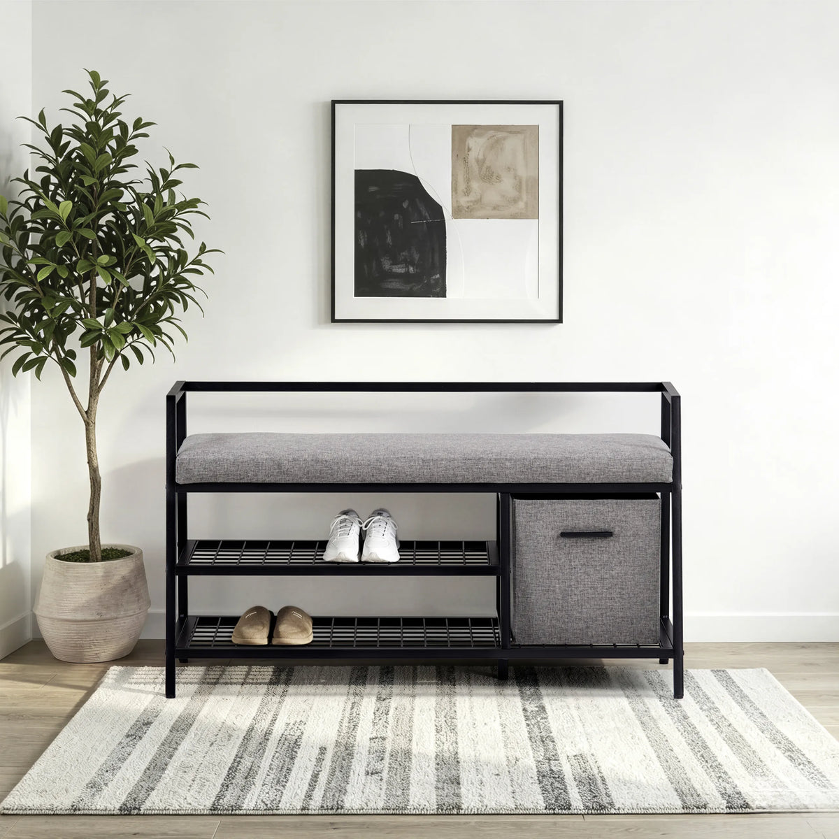 Armario zapatero Estha Loft en negro y gris con cojín para asiento, dos estantes y una cesta de tela de hjh LIVING