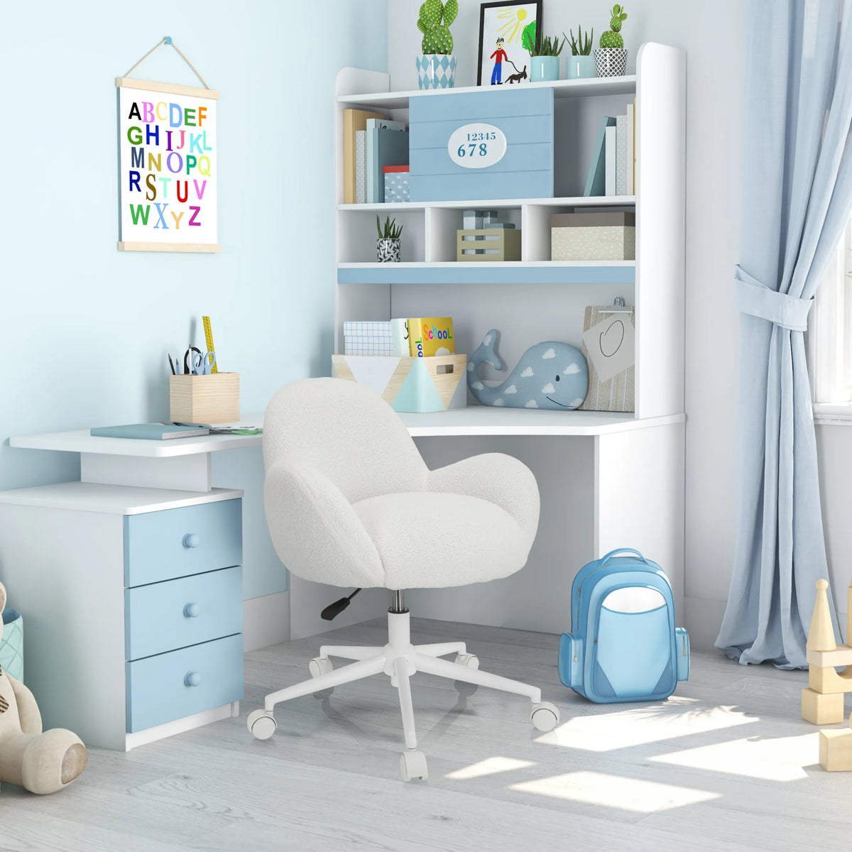 Silla giratoria para niños KID TEDDY I blanca con base de estrella y ruedas en un escritorio blanco de hjh OFFICE