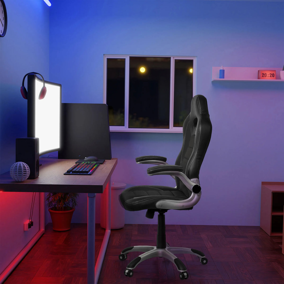 Silla gaming GAME SPORT negra con reposabrazos en un escritorio en una habitación iluminada de hjh OFFICE