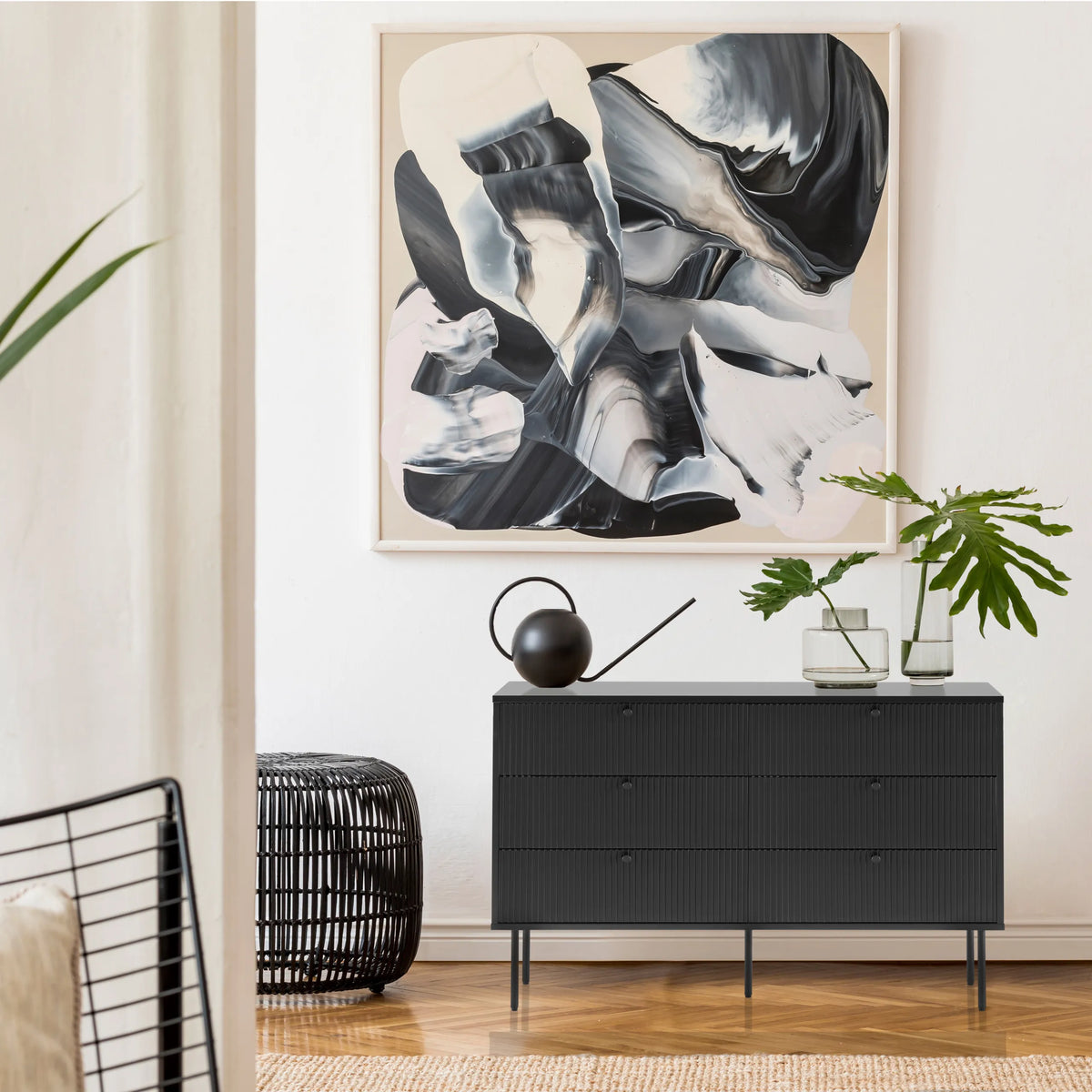 Aparador negro KARBY S con tres cajones y patas delgadas de hjh LIVING