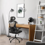 Silla de oficina profesional ARIGANO negra con respaldo de malla y reposacabezas en un escritorio de hjh OFFICE