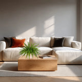 Planta artificial verde Proliferum en una maceta blanca sobre una mesa de madera de hjh OFFICE
