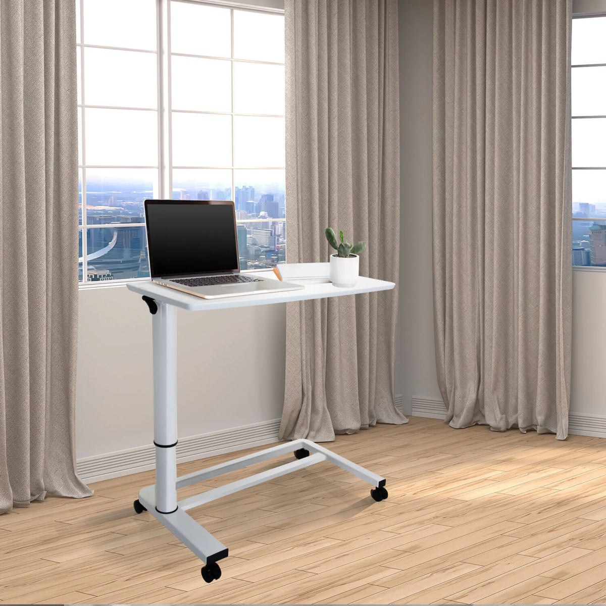 Escritorio de pie blanco STAND II con ruedas y portátil sobre un suelo de madera clara de hjh OFFICE