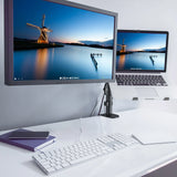 Soporte de monitor VM-MH2 negro con una pantalla acoplada sobre un escritorio blanco de hjh OFFICE