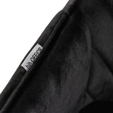 Etiqueta con el logotipo en el tapizado de tela negra de la Silla de comedor CHARVELLE de hjh LIVING