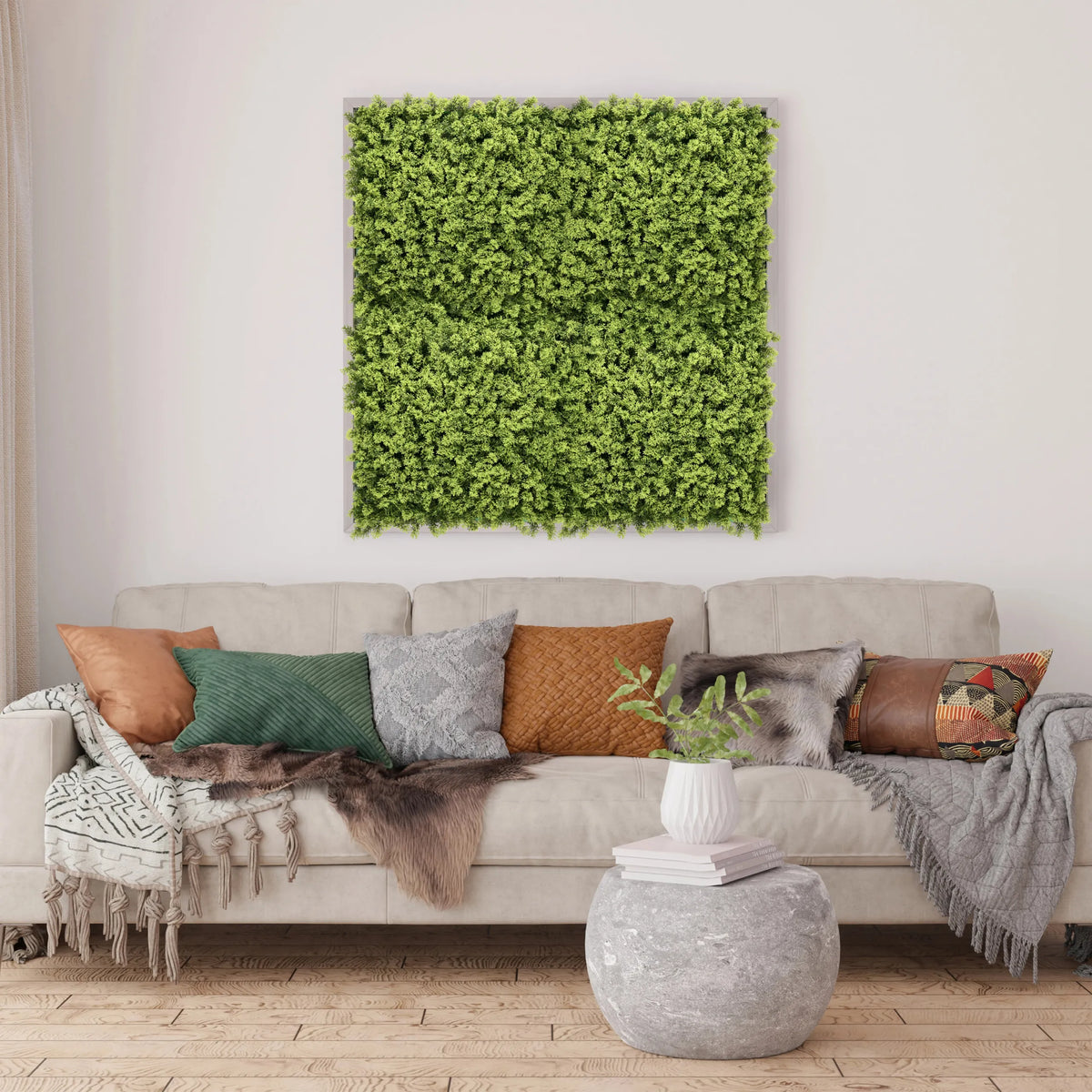 Estera vegetal verde LEAFLUXE 3 como cuadro cuadrado sobre un sofá de hjh LIVING