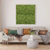 Estera vegetal verde LEAFLUXE 3 como cuadro cuadrado sobre un sofá de hjh LIVING
