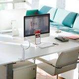 Soporte para teléfono móvil y tableta FLEXMOBI I blanco en un escritorio con un smartphone de hjh OFFICE