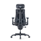 Vista posterior de la silla alta gama LiberNovo Omni Gen en gris oscuro con reposacabezas y base de estrella de Libernovo