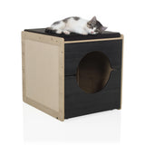 Casa para gatos KITTY PAWBOX 2 en negro y roble con un gato tumbado en el tejado de hjh LIVING