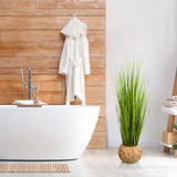 Planta artificial verde CORTADERIA en una cesta tejida como decoración de hjh OFFICE
