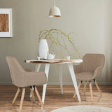 Dos sillas tapizadas SCANDI SOFT beige con patas de madera en una mesa de comedor redonda de hjh LIVING