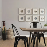 Sillas de comedor VANTAGGIO COMFORT de metal negras en una mesa de madera de hjh OFFICE