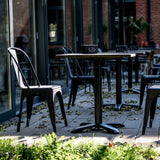 Silla de comedor negra VANTAGGIO BRUSH con mesa a juego en el exterior de hjh OFFICE
