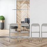 Sillas plegables TUDELA BASIC grises de PVC en un entorno de oficina moderno de hjh OFFICE