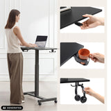 Escritorio de pie Stand K negro con portavasos y gancho para auriculares de hjh OFFICE (imagen generada por IA)