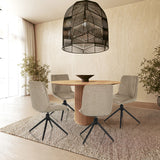 Cuatro sillas tapizadas TARVISO I en beige con patas estrella negras en una mesa redonda de madera de hjh LIVING
