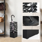 Soporte para paraguas PLUVARIS como Accesorios en color negro con estructura de rejilla y bandeja de goteo de hjh LIVING