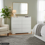 Cómoda blanca OSOYRO con seis cajones en una habitación iluminada de hjh LIVING (imagen generada por IA)