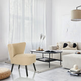 Sillón de diseño MANISO beige con patas negras en una estancia amueblada de forma moderna de hjh LIVING