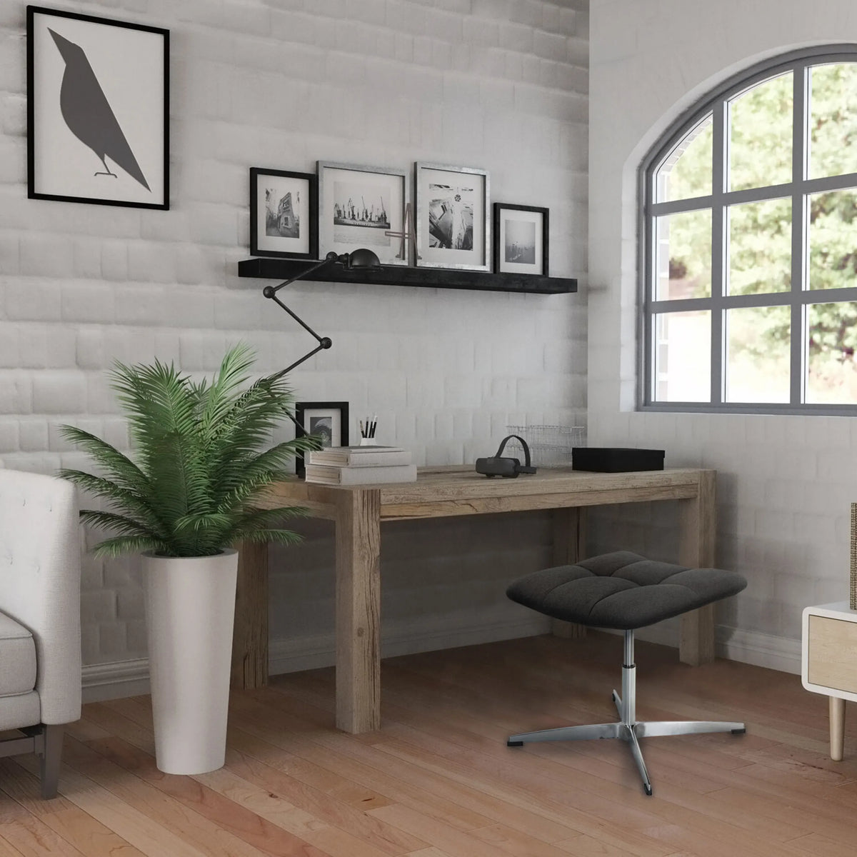 Taburete tapizado SARANTO con funda de tela negra y base metálica de cuatro radios en una habitación luminosa de hjh OFFICE