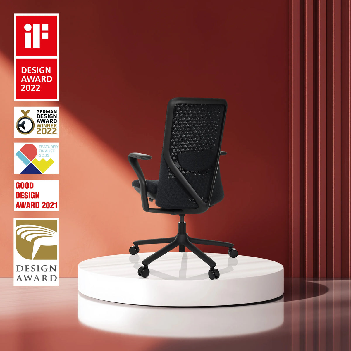 Silla alta gama VERVIO negra con respaldo de malla sobre un pedestal blanco de hjh OFFICE