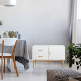 Aparador blanco TAROLO con dos cajones, una puerta y patas de madera clara de hjh LIVING