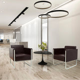 Dos sillones tapizados ARUBA marrones con estructuras metálicas plateadas y una mesa auxiliar redonda de hjh OFFICE