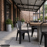 Sillas de comedor negras Vantaggio Poly en una mesa de madera al aire libre de hjh OFFICE (imagen generada por IA)