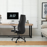 Sillón de oficina profesional VITORO B negro en un entorno de oficina en casa junto a un escritorio de hjh OFFICE