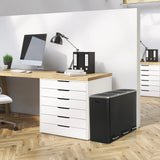 Papelera negra Clean 9 con dos compartimentos junto a un escritorio de hjh OFFICE