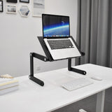 Soporte de escritorio VM-SA II en negro con un portátil sobre un escritorio blanco de hjh OFFICE