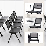 Silla de confidente MEET WA en negro con respaldo de malla, reposabrazos y tableta abatible de hjh OFFICE