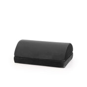Reposapiés negro Podi Velvet 1 con una superficie acolchada y semicircular de hjh OFFICE